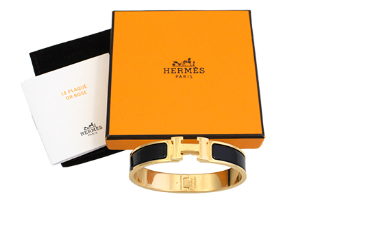 1 BRACCIALE FIRMATO HERMÈS “CLIC H” IN METALLO PLACCATO ORO ROSA E SMALTO NERO, (MISURA 17 CM) FORNITO DI SCATOLA ORIGINALE